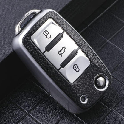 Soft TPU Leather Pattern Key Cover Compatible with Polo, Vento, Jetta, Ameo, Passat & Skoda Rapid, Laura, Superb, Octavia, Fabia, Yeti Folding Flip Key (Silver Black, Pack of 1).